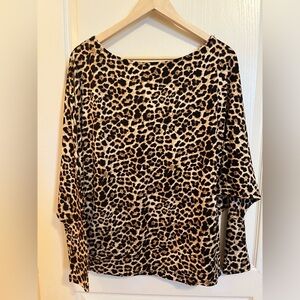 Reb. In J. 220 leopard butterfly jersey. 3/4 sleeves. Lower band.